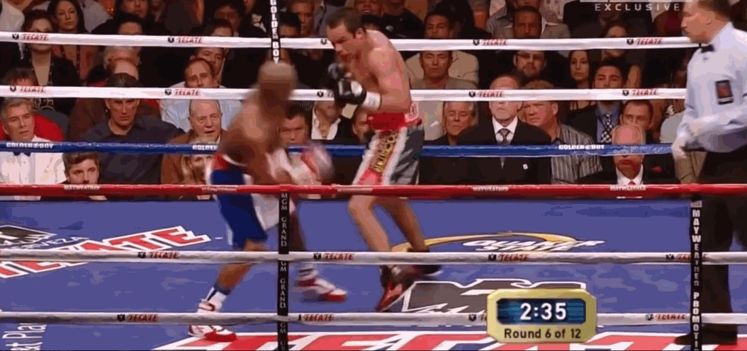 Mayweather executing a pull counter against Marquez's jab